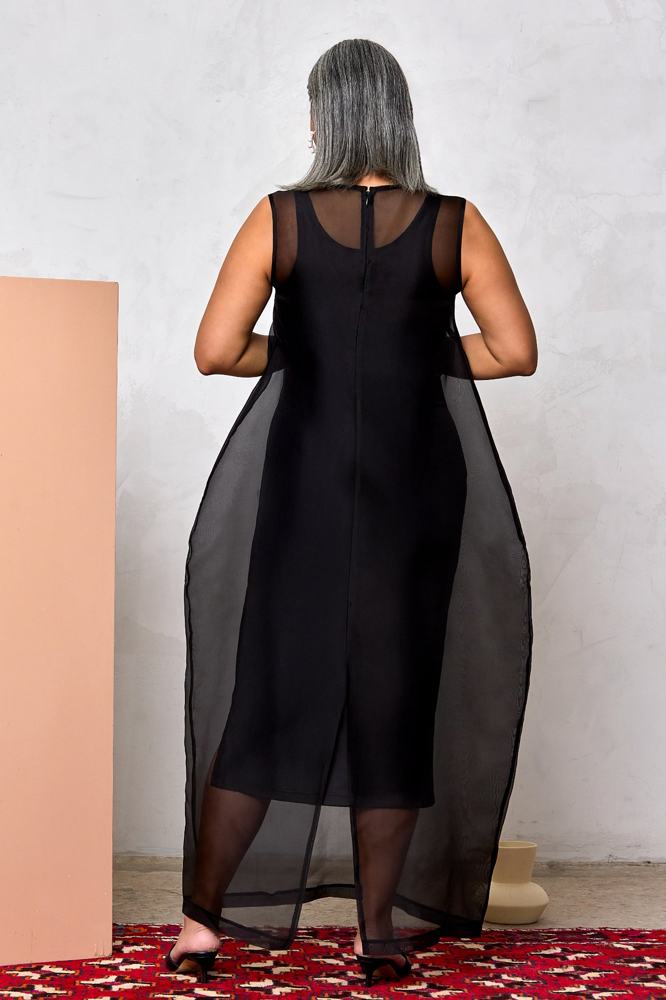 Robe superposée avec fente arquée